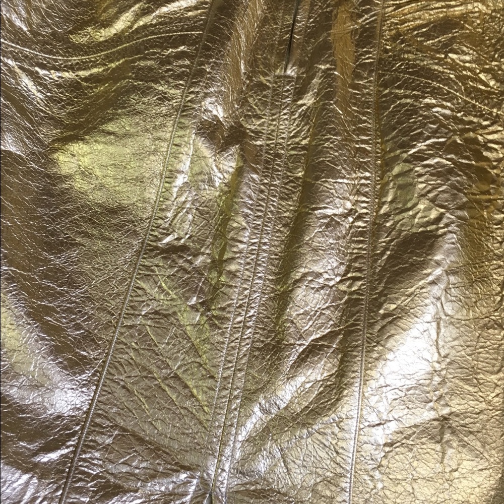 Two jackets and gold leather skirt